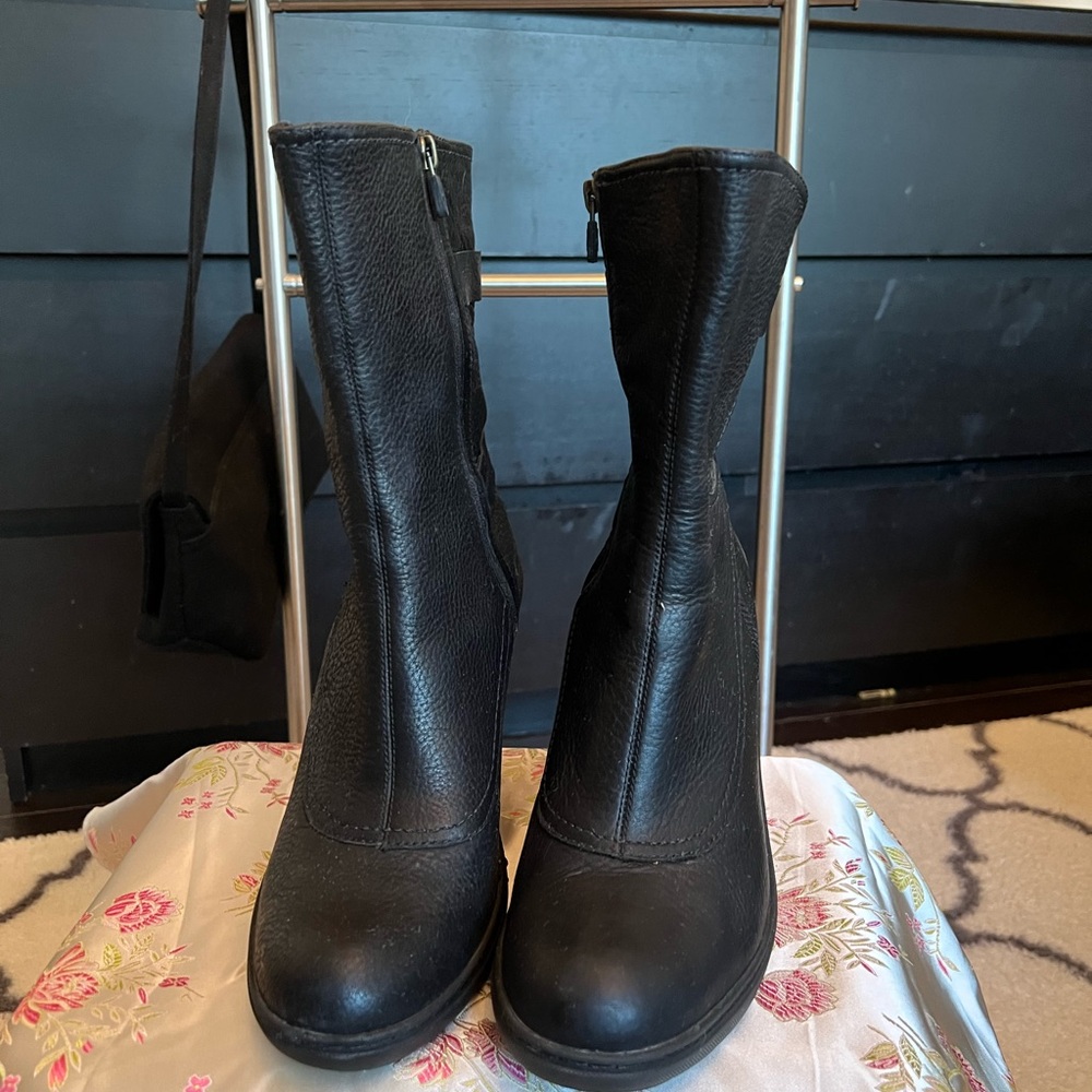 Timberland ankle boots with 3 1/2 inch wedge heel. Excellent condition.